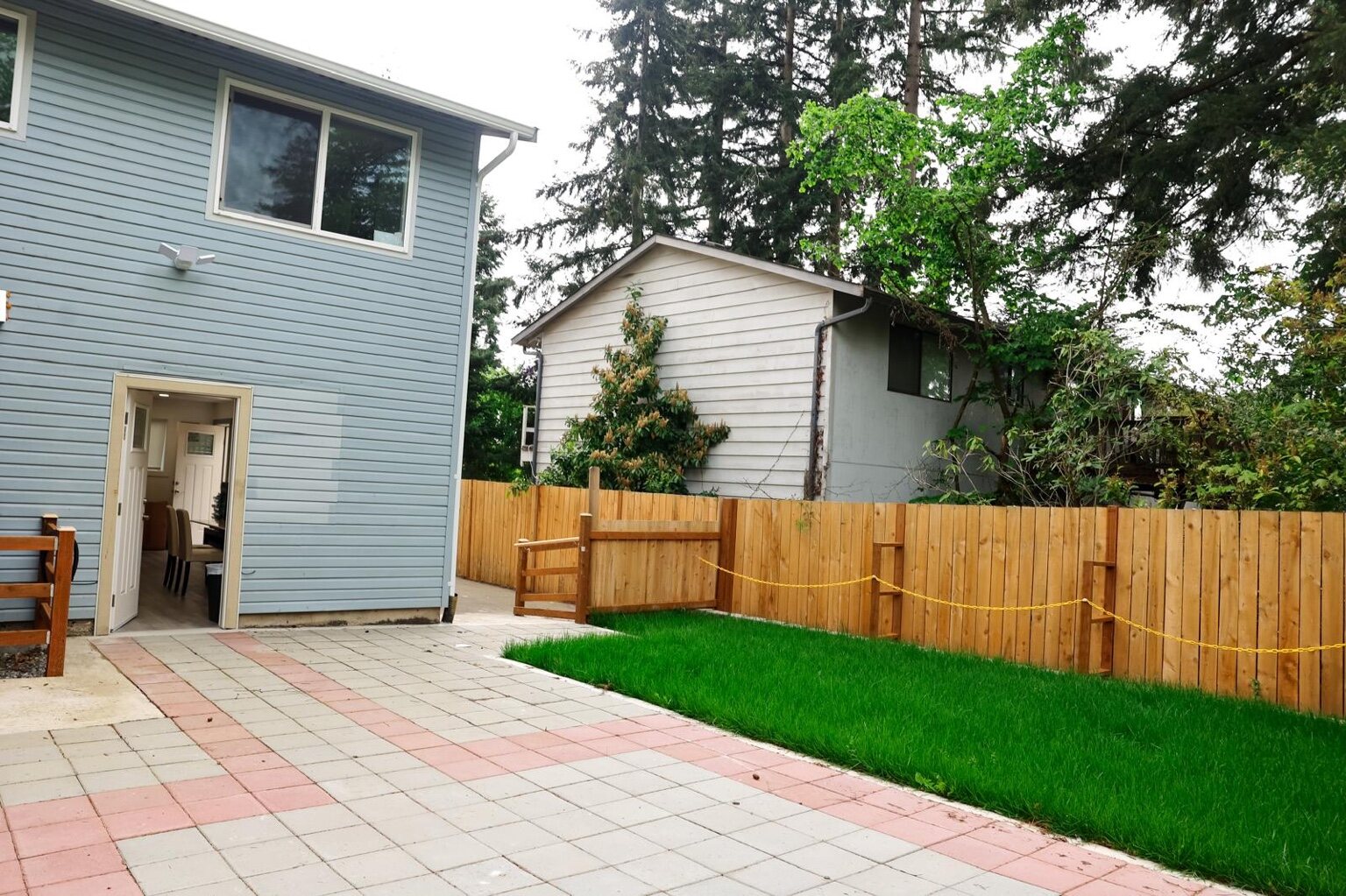 Level patio and fenced outdoor area